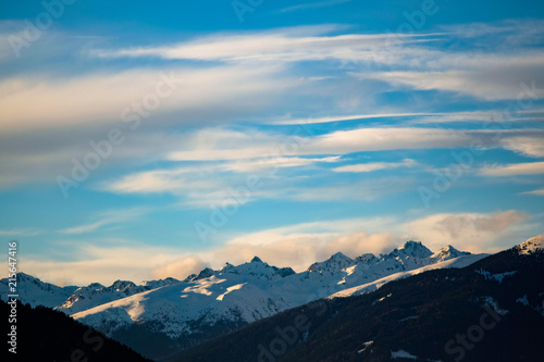 Clouds in the Snow covered Mountains © Timm
