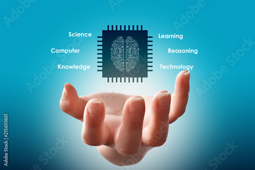 Fototapeta Naklejka Na Ścianę i Meble -  Artificial intelligence concept (AI), hand holding digital brain inside chip, surrounded with conceptual text messages on blue background