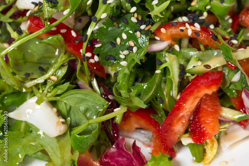 Fresh herbs salad with sesame.