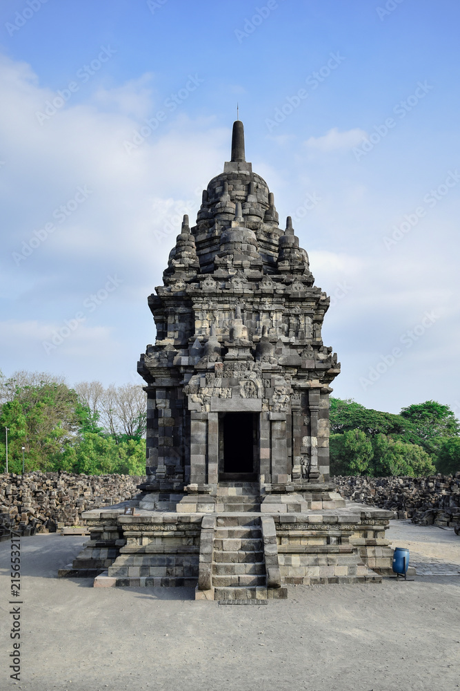 Buddhist temple with blue sky in complex of candi sewu or sewu temple, near Prambanan, Central Java, Indonesia. Buddhist temple with blue sky in complex of candi sewu or sewu temple, near Prambanan, Central Java, Indonesia.