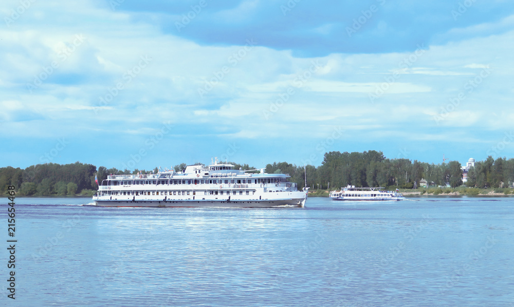 Large and small ships on the Volga river near the Spit of Yaroslavl. Large and small ships on the Volga river near the Spit of Yaroslavl.