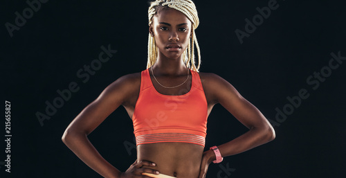 Portrait of a female athlete in fitness clothes