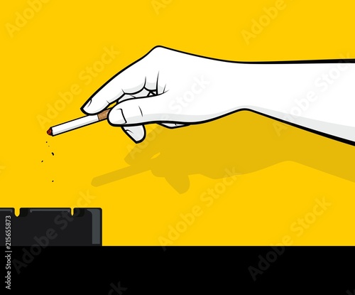 ashtray and hand holding cigarette