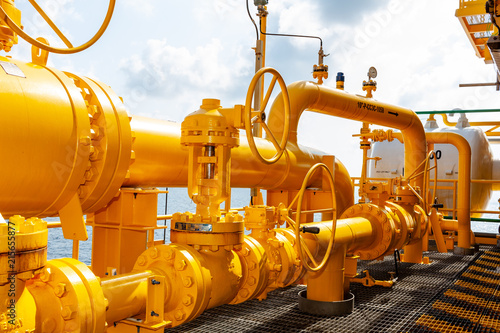 Offshore oil and Gas central processing platform and remote platform produced oil, natural gas and liquid condensate for set to onshore refinery from offshore in ocean sea background.