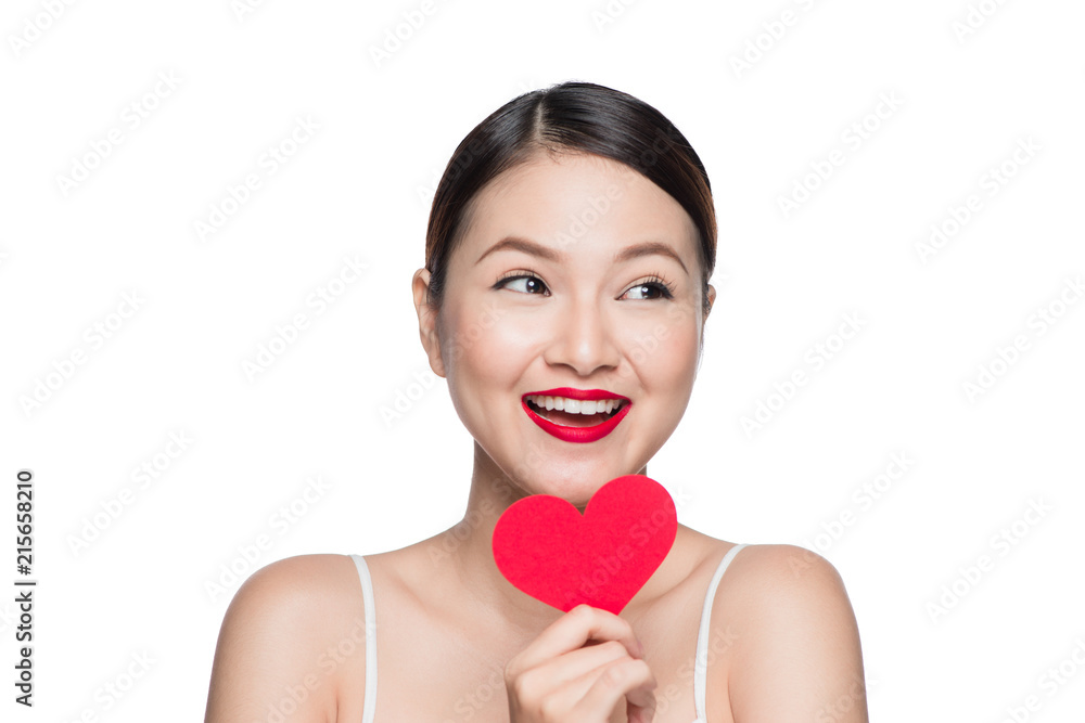 Attractive young woman with red heart. Valentine's day art portrait. Perfect make up Attractive young woman with red heart. Valentine's day art portrait. Perfect make up
