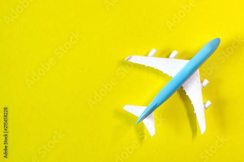 airplane on a yellow background