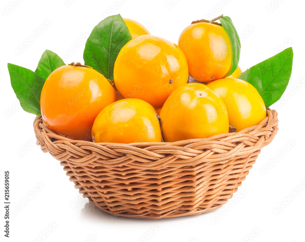 persimmon in basket on white background persimmon in basket on white background