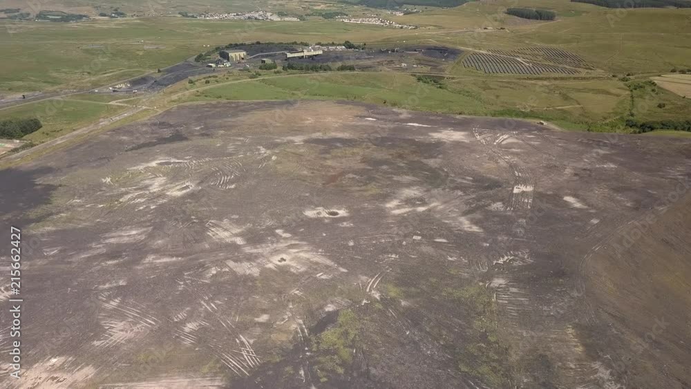 Aerial drone view of a large, full and covered landfill garbage disposal site Aerial drone view of a large, full and covered landfill garbage disposal site
