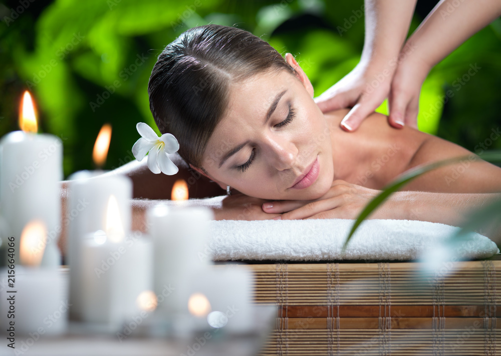 portrait of young beautiful woman in spa environment. portrait of young beautiful woman in spa environment.