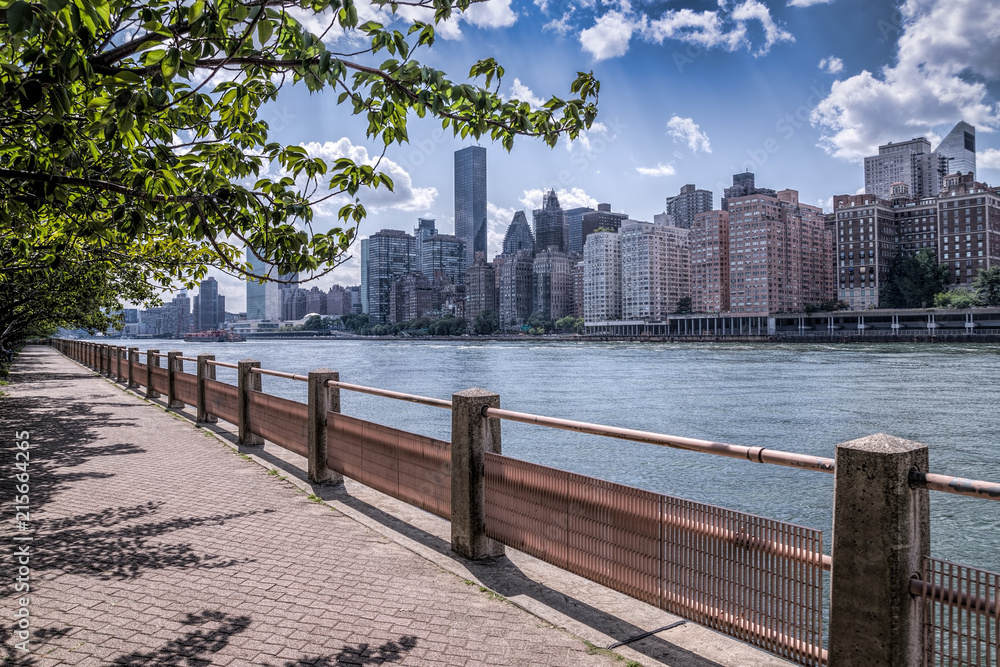 New york city skyline of midtown Manhattan and a path