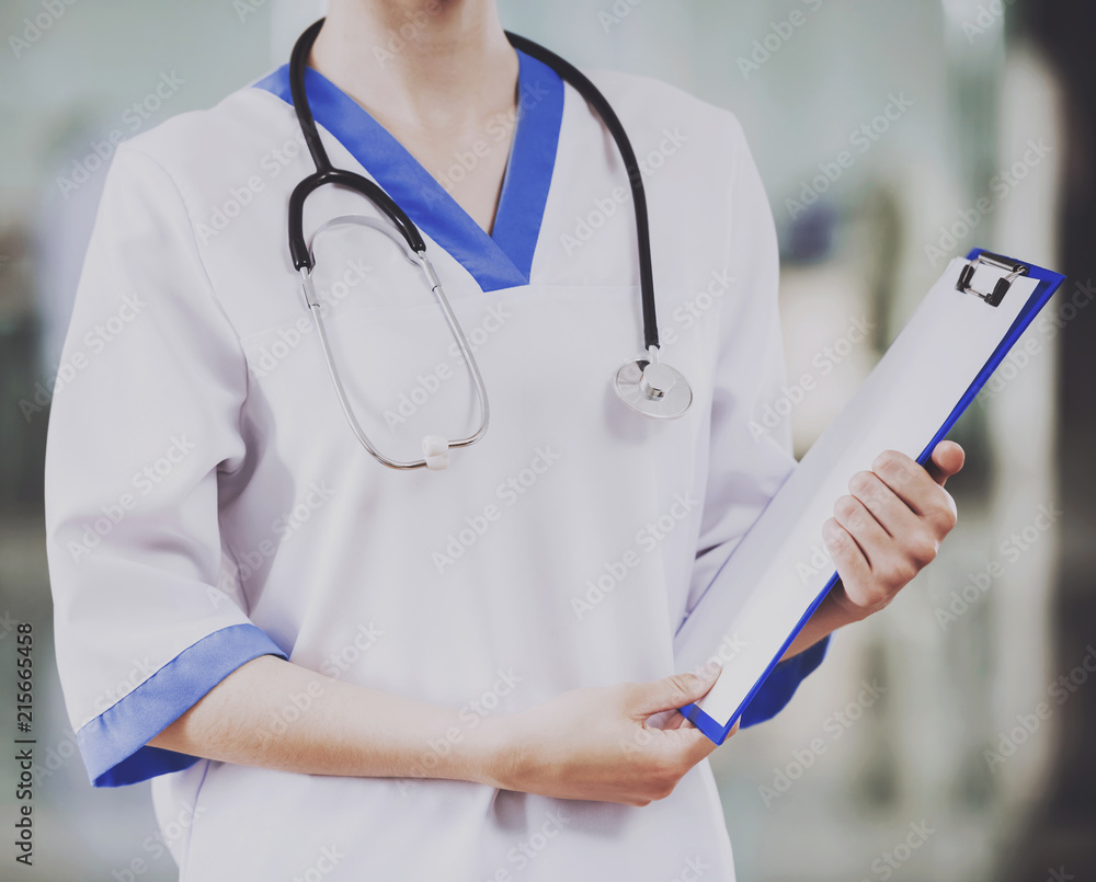 Close up. Young Female Doctor with Stethoscope.