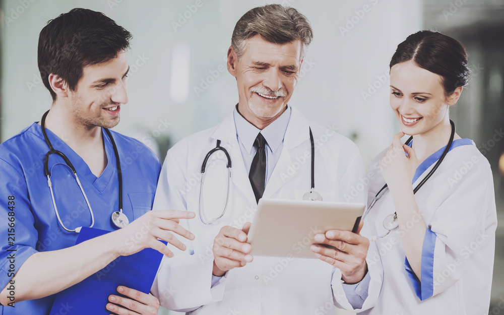 Team of Doctors with Stethoscopes in Uniform. Team of Doctors with Stethoscopes in Uniform.