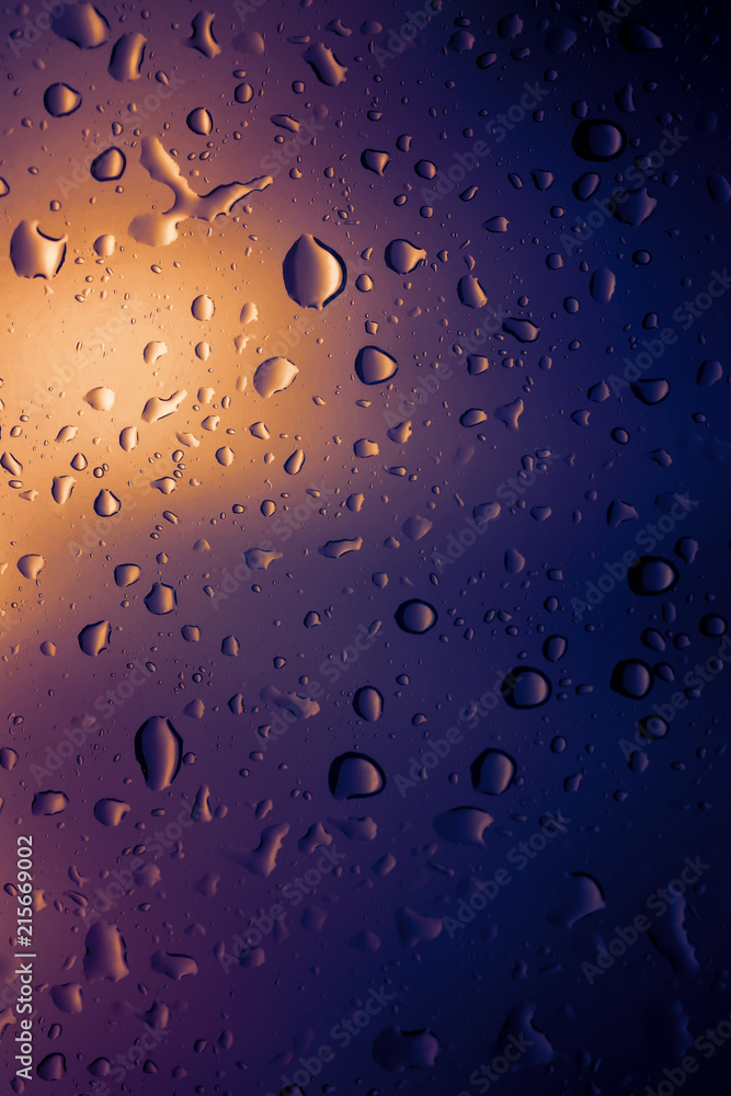 Water drops background.View through the window of strong rainy day ,Shallow depth of field composition and color toned. Water drops background.View through the window of strong rainy day ,Shallow depth of field composition and color toned.