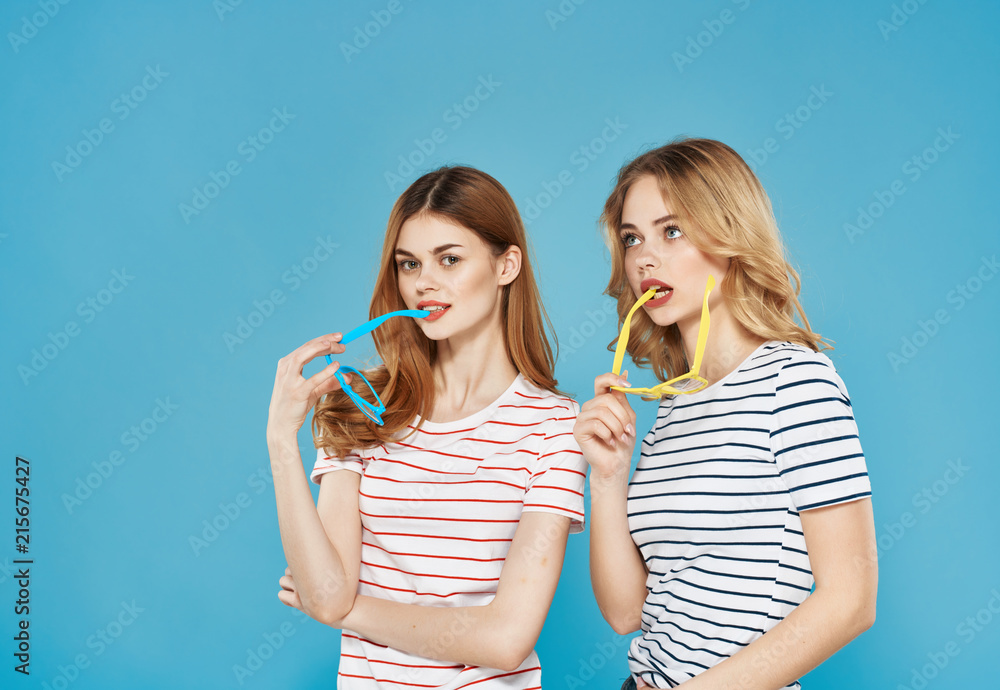 girlfriends with glasses on a blue background girlfriends with glasses on a blue background