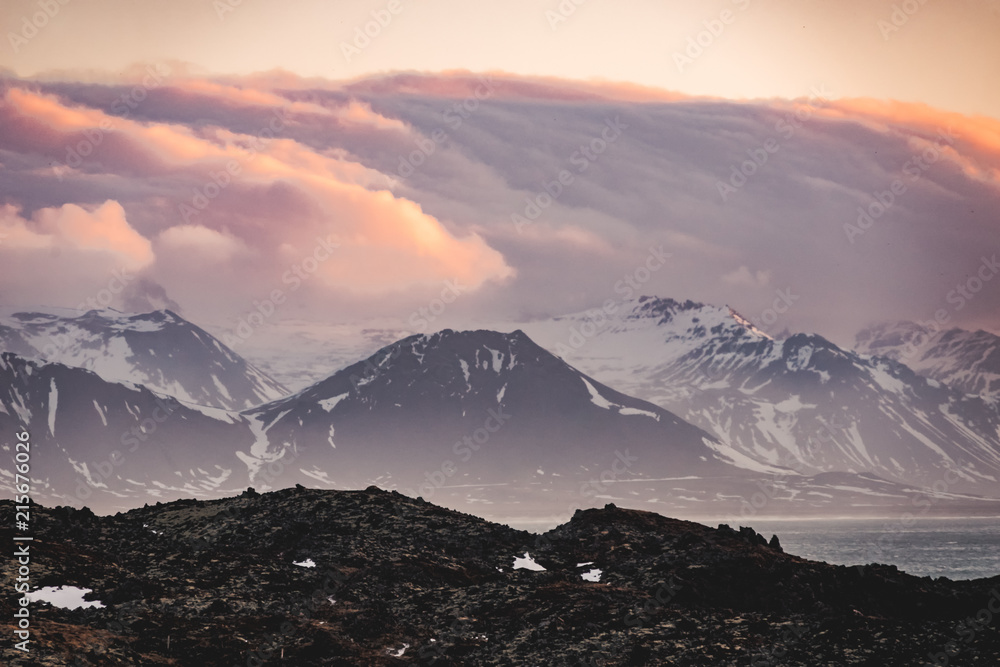 Obraz premium Typical Icelandic sunrise sunset mountain landscape at Arnarstapi area in Snaefellsnes peninsula in Iceland