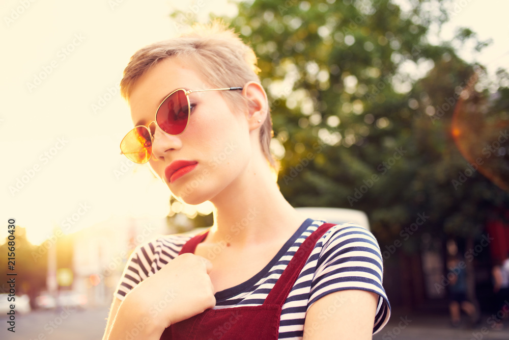 woman with glasses street sun woman with glasses street sun