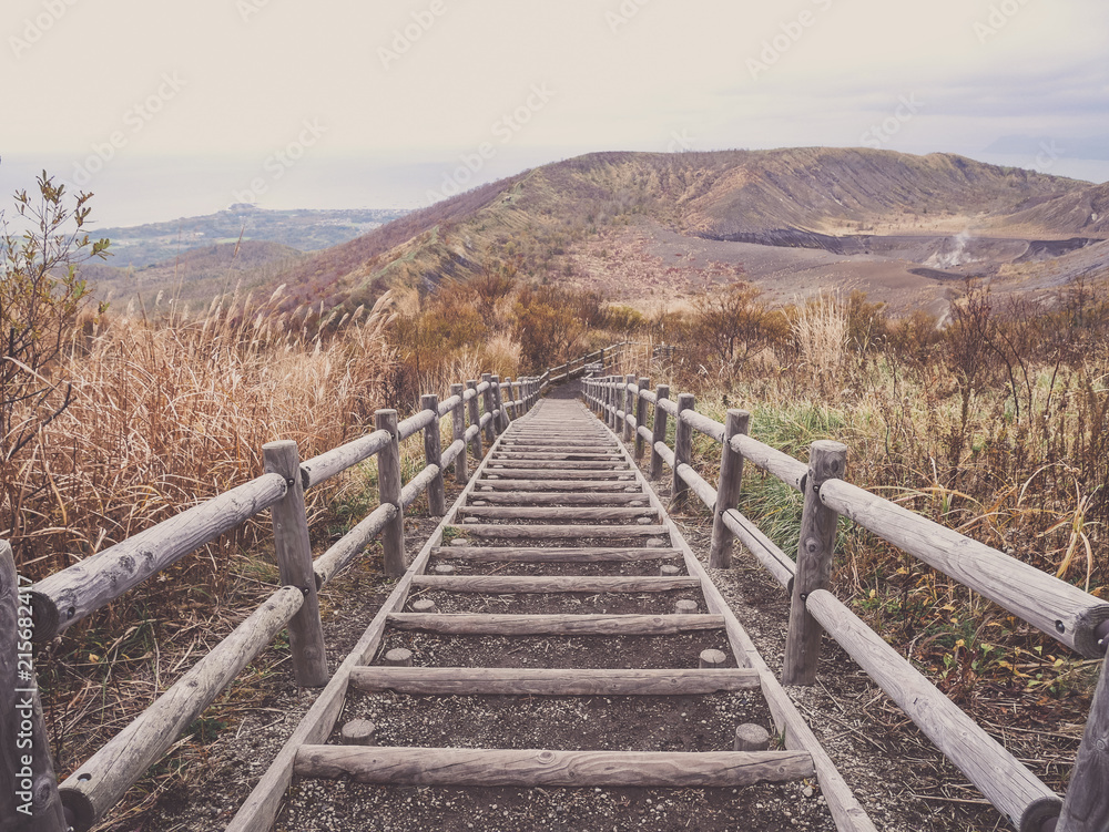 Wooden stairs on Mt. Usu or Ususan at Hokkaido, Japan. With retro photo filter.