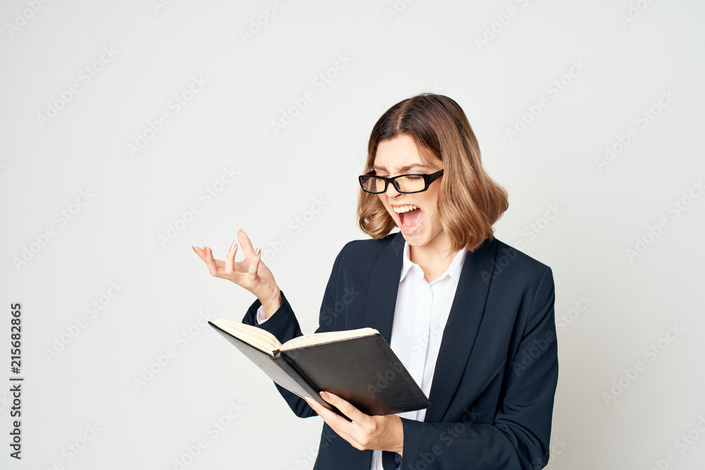 woman in a business suit with documents woman in a business suit with documents