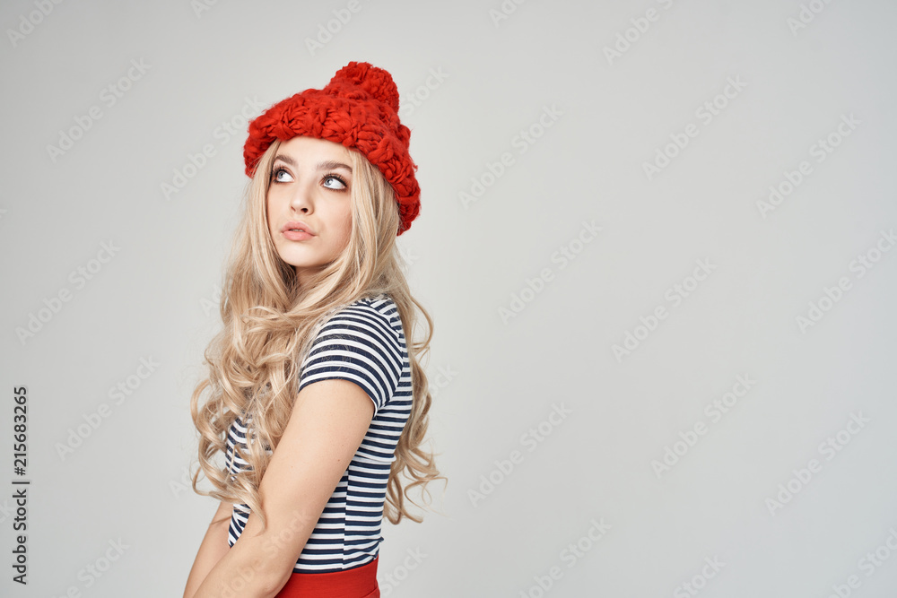 blond woman in red hat portrait blond woman in red hat portrait