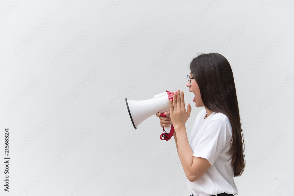 Beautiful asian woman with speaker in hand on white background,angry woman concept,Thailand people Beautiful asian woman with speaker in hand on white background,angry woman concept,Thailand people