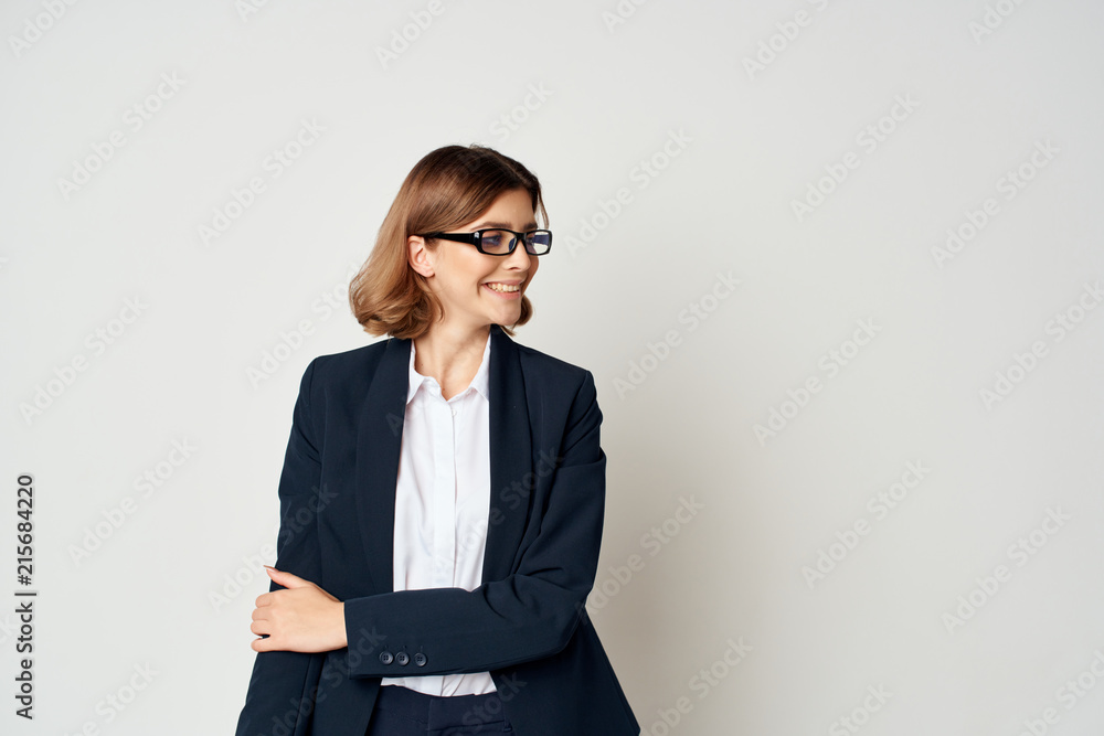 woman in business suit sitting woman in business suit sitting