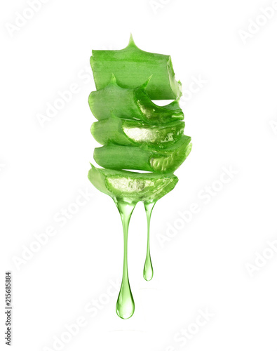 Cutted stems of aloe vera with juice on white background