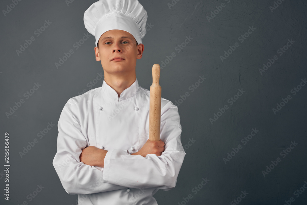 cook holding a gurney cook holding a gurney