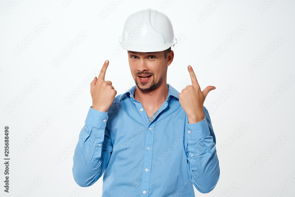 builder in a white architecture helmet builder in a white architecture helmet