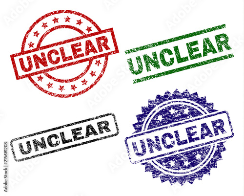 UNCLEAR seal prints with corroded surface. Black, green,red,blue vector rubber prints of UNCLEAR caption with dirty surface. Rubber seals with circle, rectangle, medallion shapes.