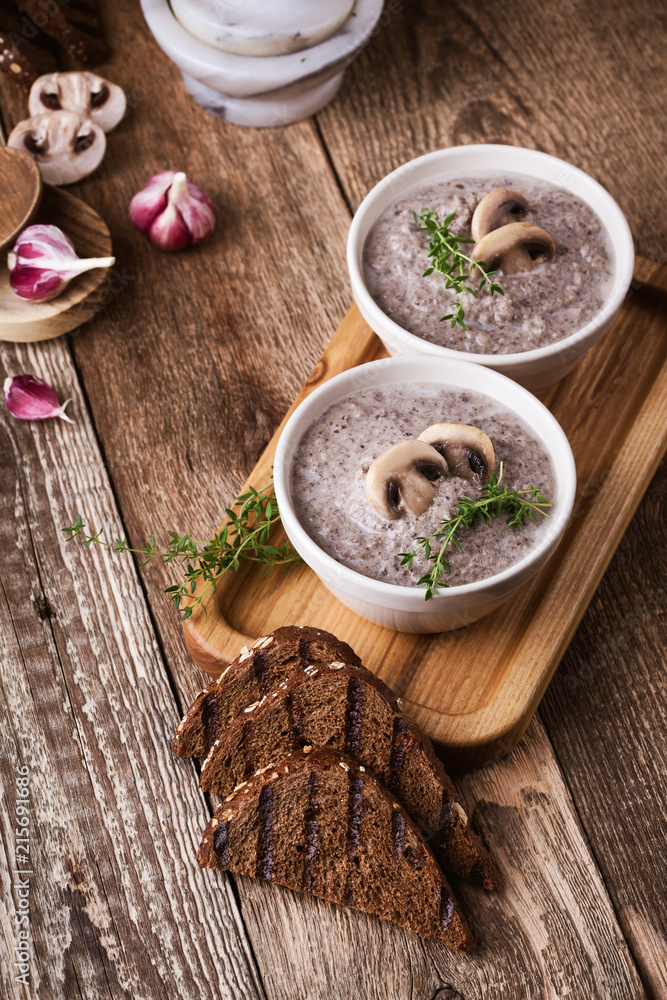 Hearty mushroom soup in ceramic bowl Hearty mushroom soup in ceramic bowl