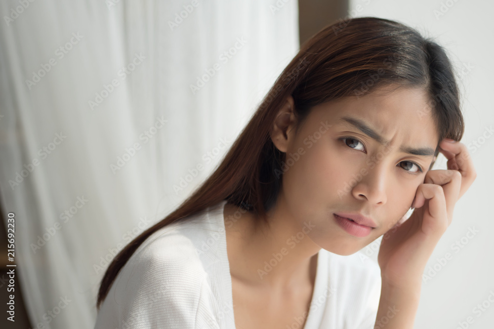 unhappy angry upset asian woman portrait with frustrated, bored, disgusted face; portrait of negative unhappy angry asian woman looking up; young adult asian persian or asian middle east woman model unhappy angry upset asian woman portrait with frustrated, bored, disgusted face; portrait of negative unhappy angry asian woman looking up; young adult asian persian or asian middle east woman model
