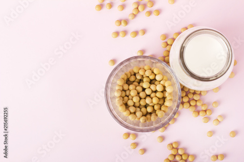 Soy products on pink background photo