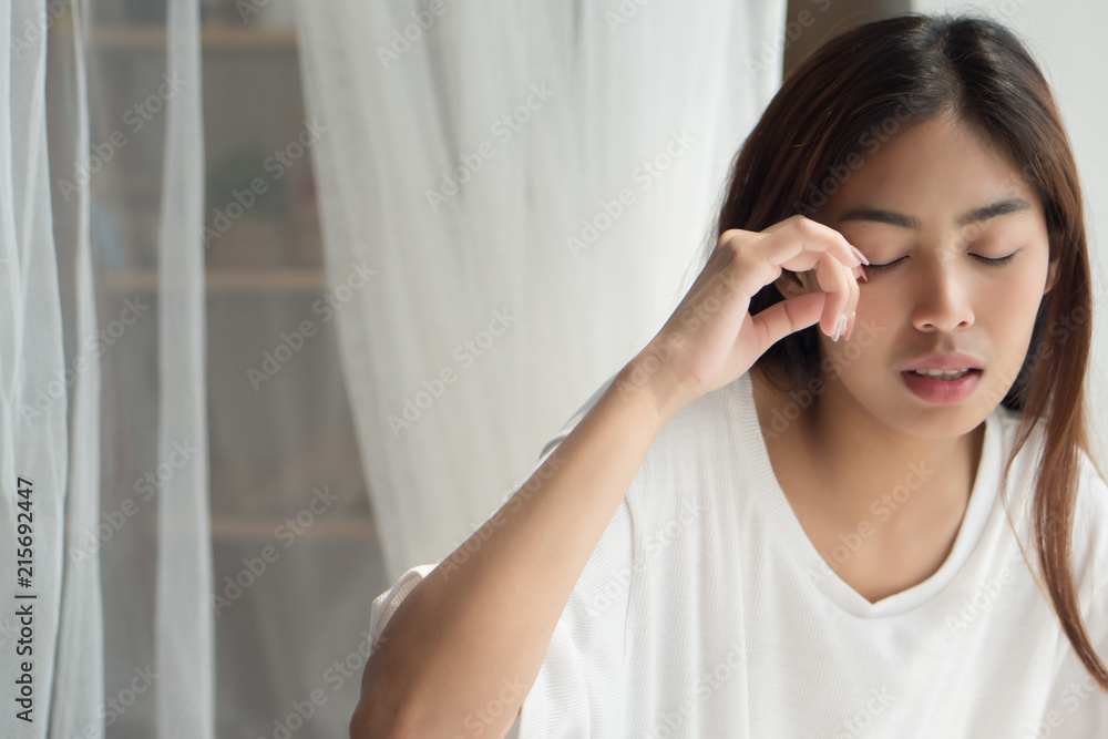 portrait of tired, exhausted, insomnia woman; portrait of tired, sleepless woman suffering from insomnia, hangover, headache; 20s young adult asian middle east mixed race 20s woman model portrait of tired, exhausted, insomnia woman; portrait of tired, sleepless woman suffering from insomnia, hangover, headache; 20s young adult asian middle east mixed race 20s woman model