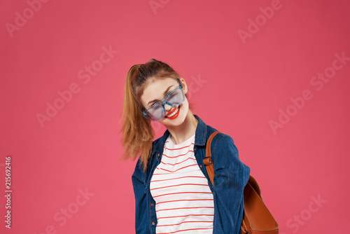 female teenager on pink background