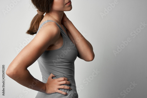 woman back pain neck