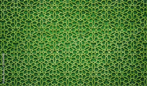 Indian, persian, elf lattice hexagonal green ornament on the floral texture 