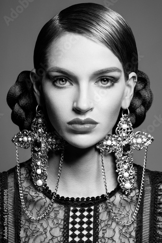 Portrait of woman with ornate earrings