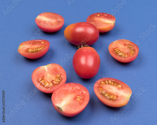 Cherry tomatoes on a colored background