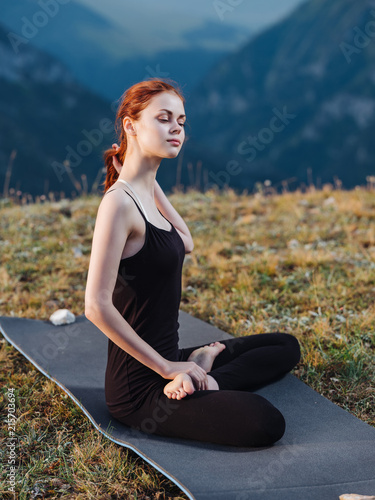 woman on yoga mountains nature