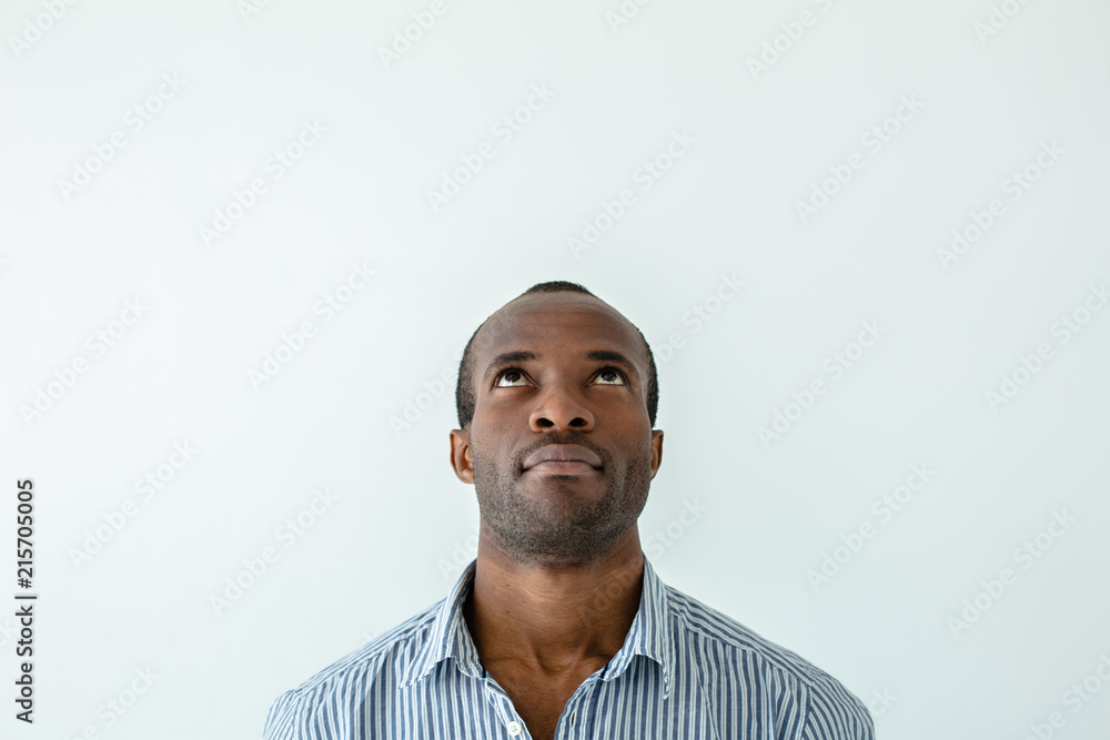 Portrait of afro american man looking up Portrait of afro american man looking up
