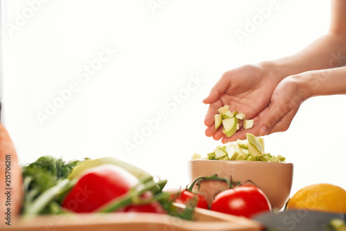 hands cutting vegetables