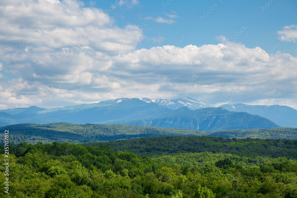 Scenic panoramic landscape of a green mountain valley