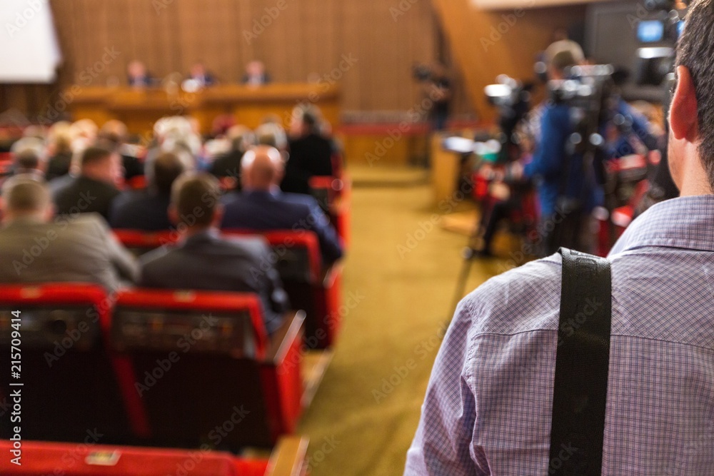 People in a Room for a Seminar / Meeting / Conference