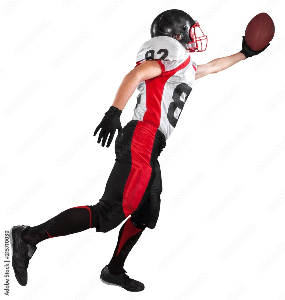 Obraz premium Football Player Running and Catching the Ball - Isolated
