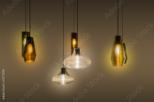 Canvas Print Beautiful glass geometric modern ceiling lamp interior contemporary decoration isolated on a dark background