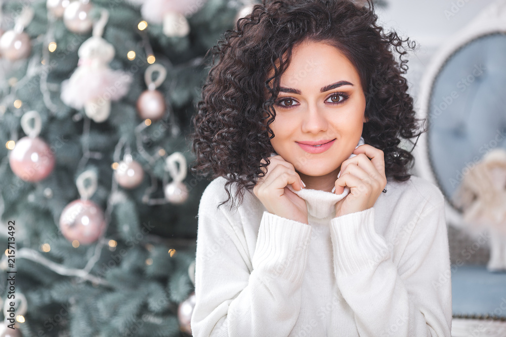 Close up portrait of beautiful woman on christmas background Close up portrait of beautiful woman on christmas background