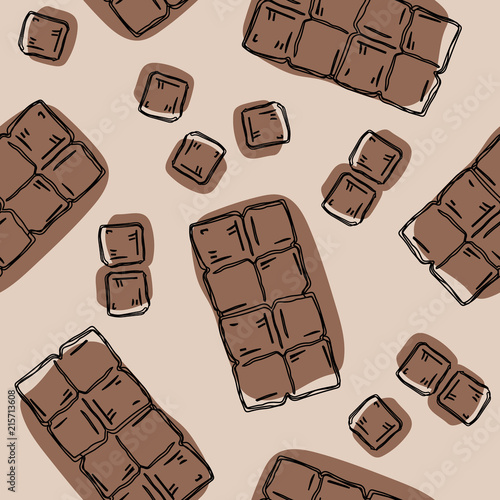 Seamless background with a pattern of hand drawn pieces of chocolate