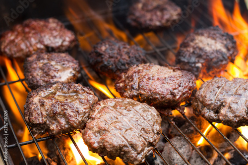 Hot Charcoal Flame Broil Hamburgers On Open Grill At Summer Time Cookout