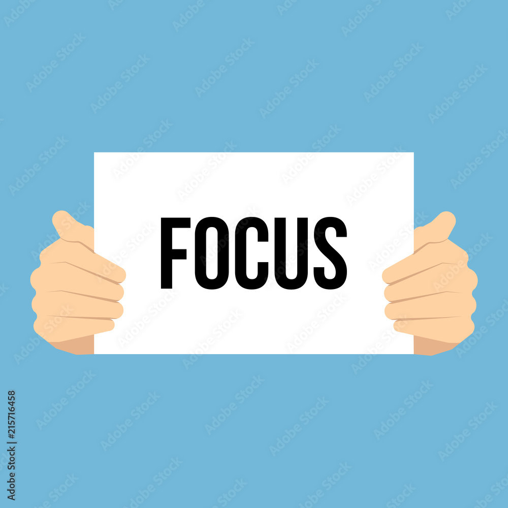 Man showing paper FOCUS text Man showing paper FOCUS text