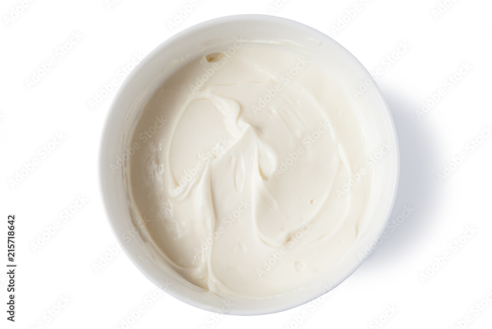 Cream cheese in a bowl, isolated on white background, top view. Cream cheese in a bowl, isolated on white background, top view.